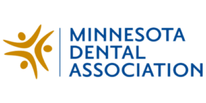 Logo of the Minnesota Dental Association. Features three abstract gold figures on the left, and bold blue text on the right. Professional and inviting.