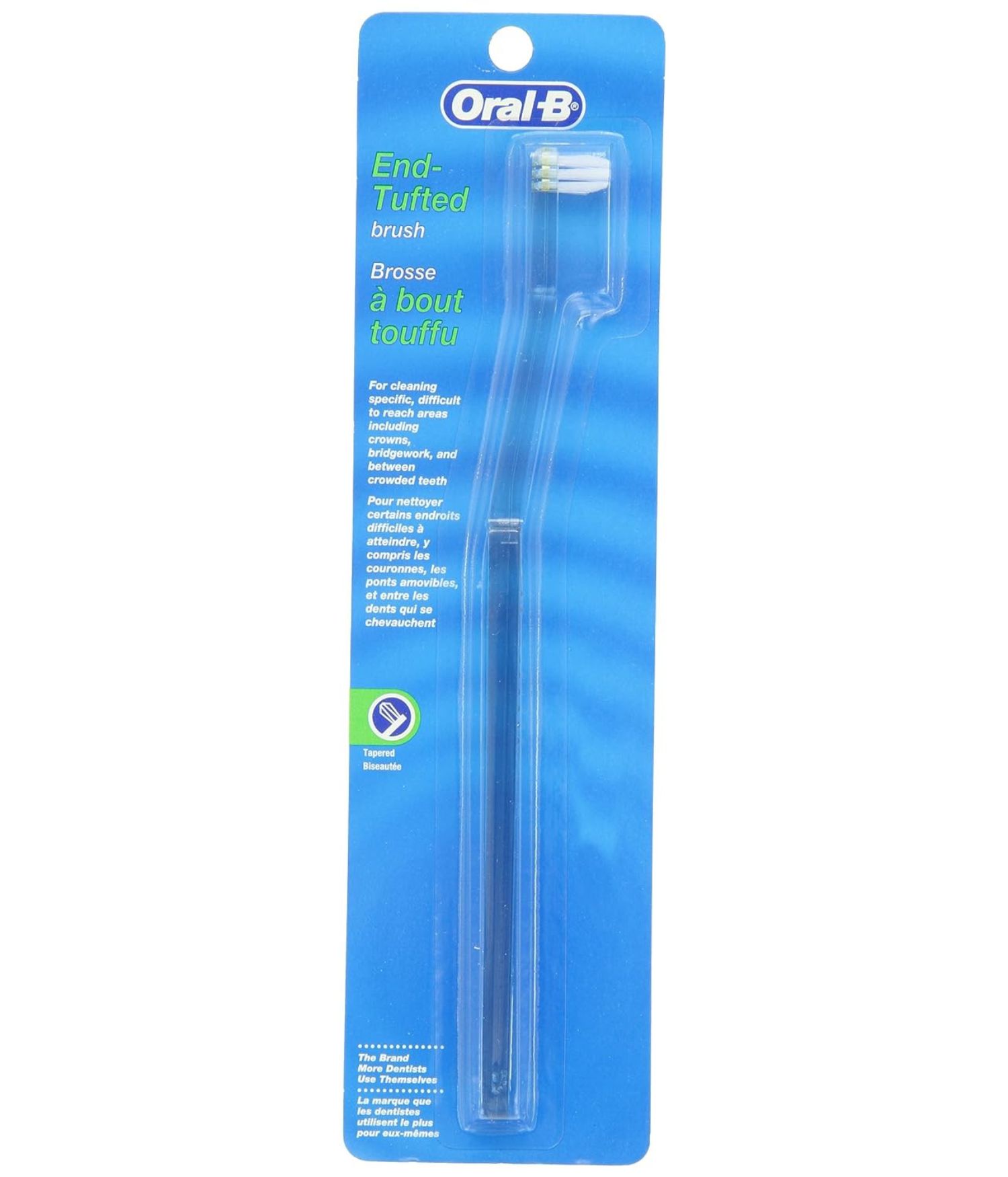 A blue packaging of an Oral-B End-Tufted brush with white and green text. The brush is visible inside, designed for detailed dental cleaning.