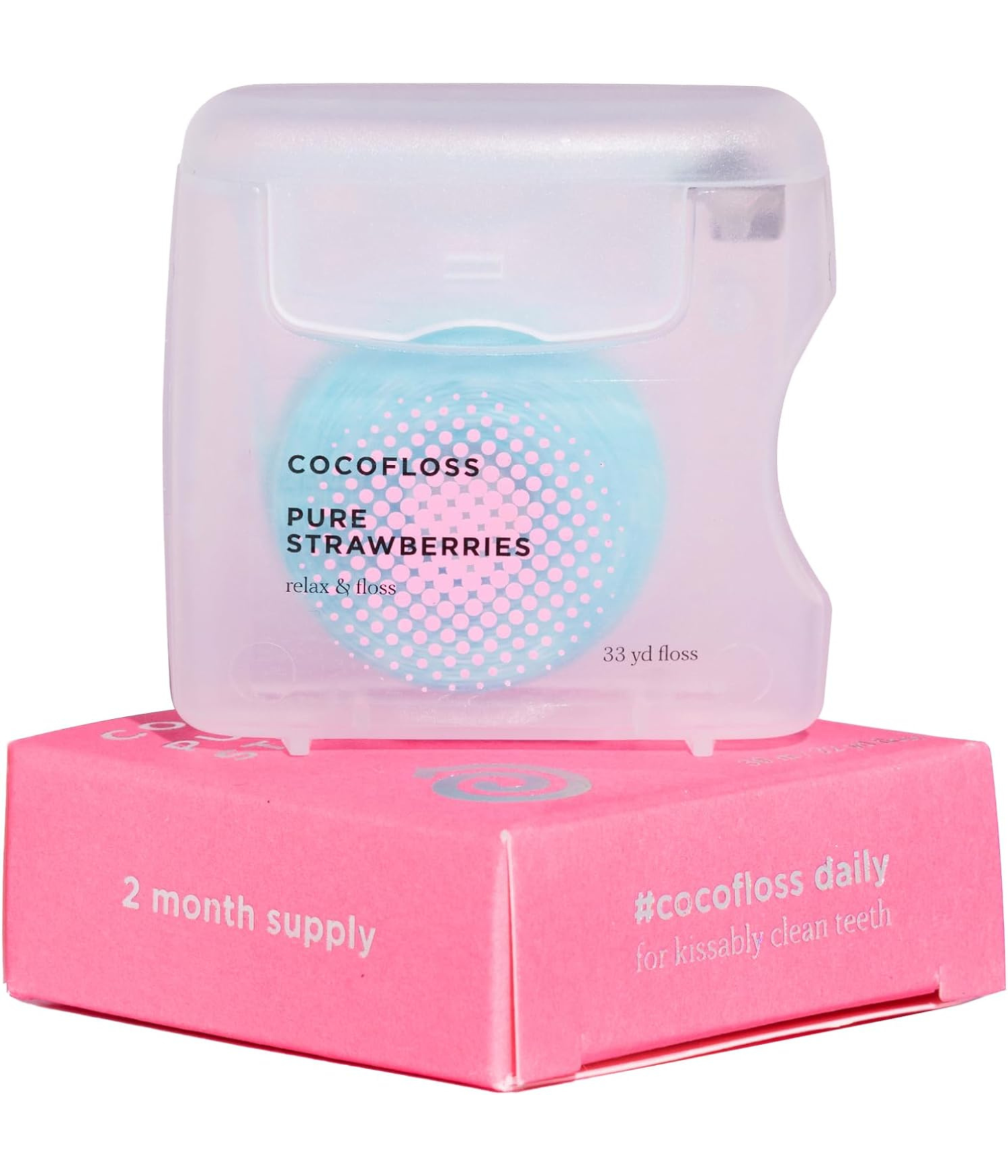 Translucent floss case labeled "Cocofloss Pure Strawberries" on a pink box. Highlights dental care with a playful, refreshing vibe.