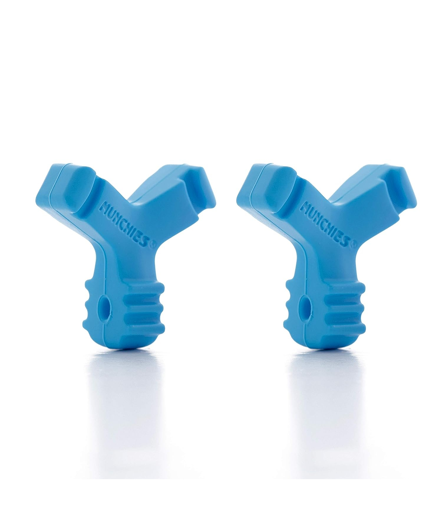 Two blue Y-shaped plastic tools with ribbed grips and text imprint, standing upright on a reflective white surface, conveying a functional, modern vibe.