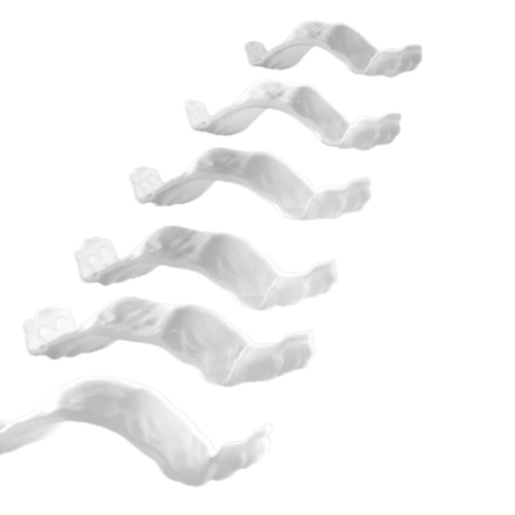 Six spiral-like white structures on a black background, labeled from Stage 0 to Stage 32, showing progressive growth in size and complexity.