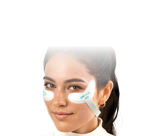 A woman with a confident smile wears two white adhesive patches on her cheeks against a black background. The tone is futuristic and sleek.